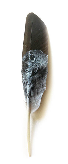 The first feather painted by The Feather Lady, now framed and displayed in the artist's home